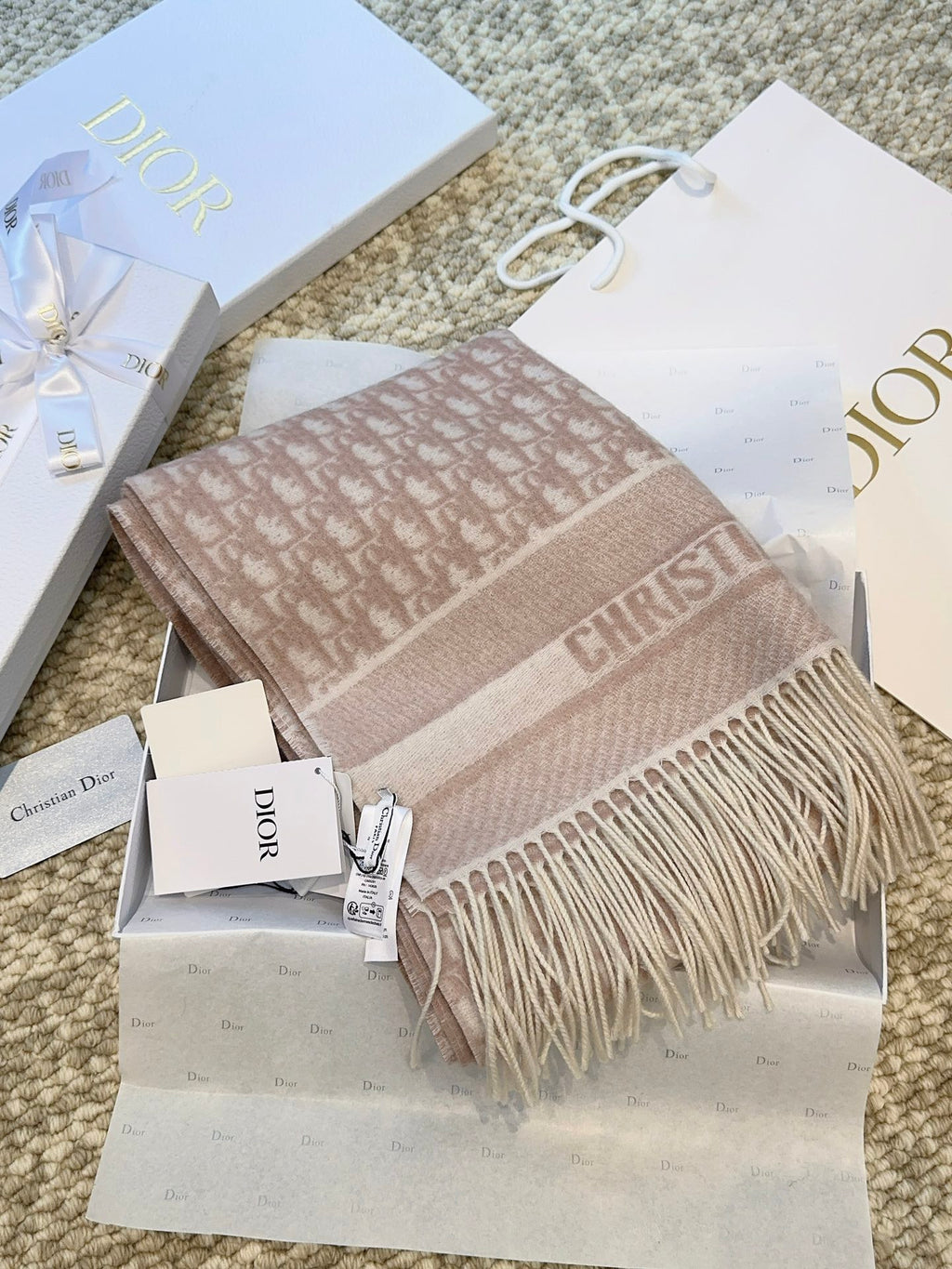 Dior scarf with branding on a branded box and packaging